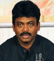 A Karunakaran  
