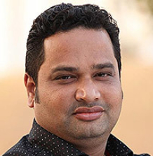 Dr. Sandesh Mhatre